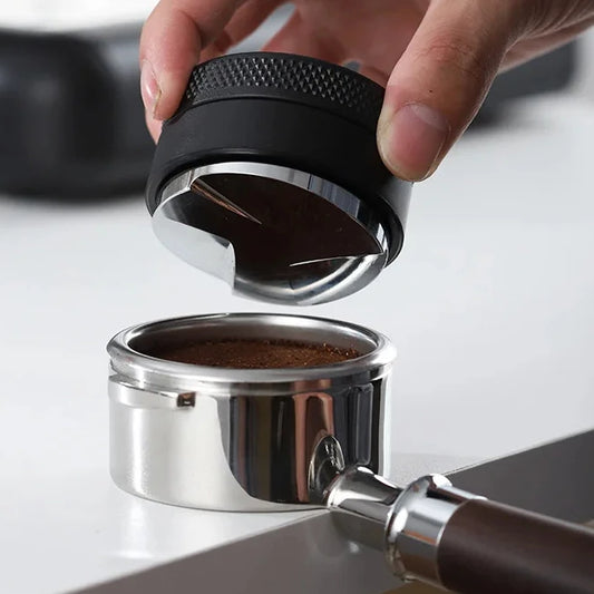 Répartiteur de mouture qui tasse du café